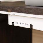 weißer Kabelhalter für den Schreibtisch